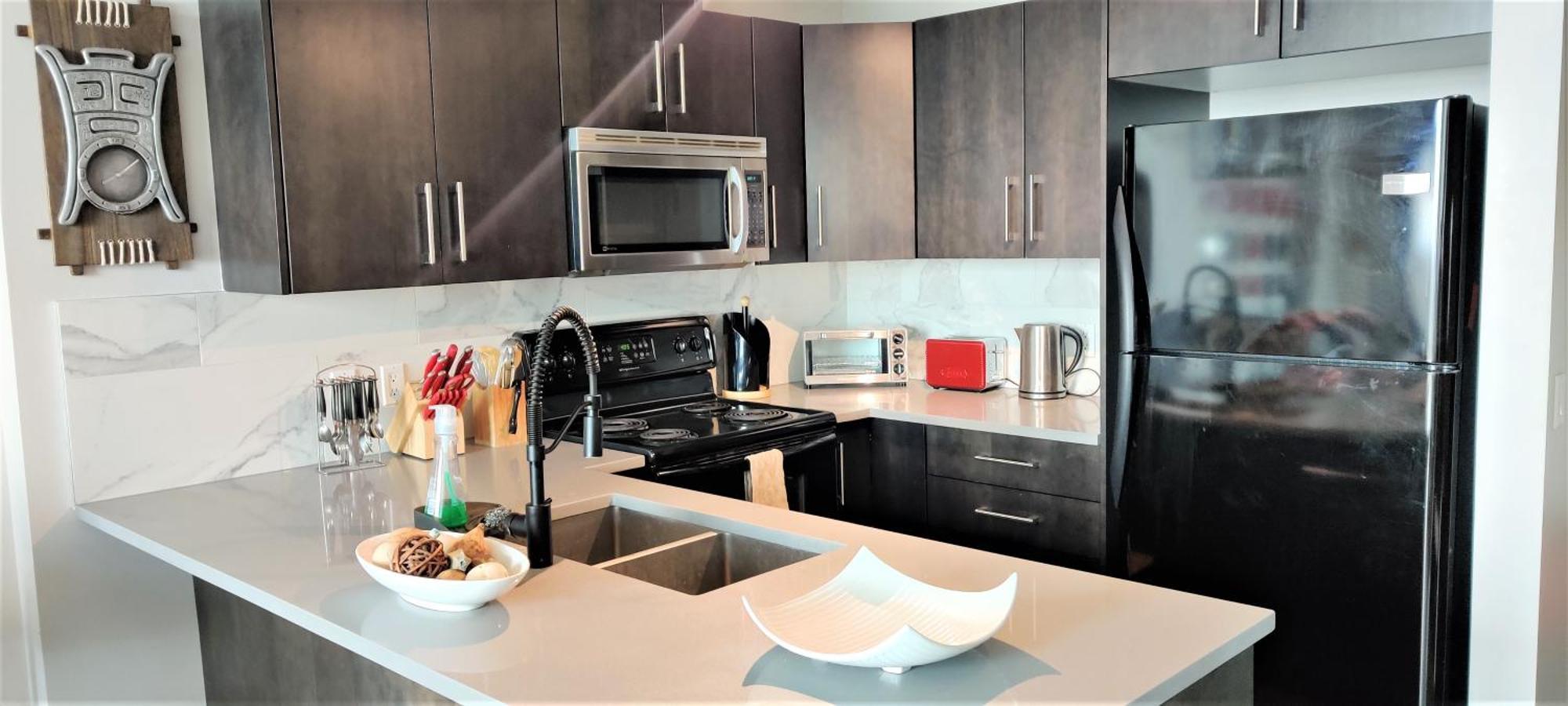 Monki Di Executive Suites - Alura Calgary Bagian luar foto